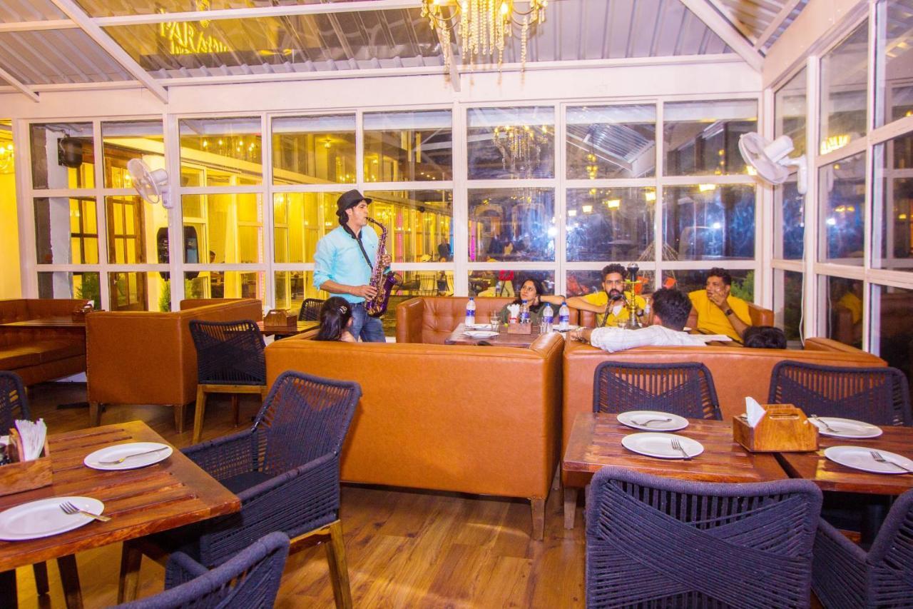 Paradise-The Whitehouse Cafe Manāli Exterior foto